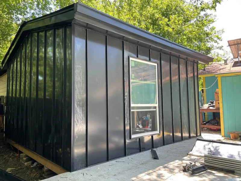 Black standing seam metal wall panels for Roof Inspection in North Versailles