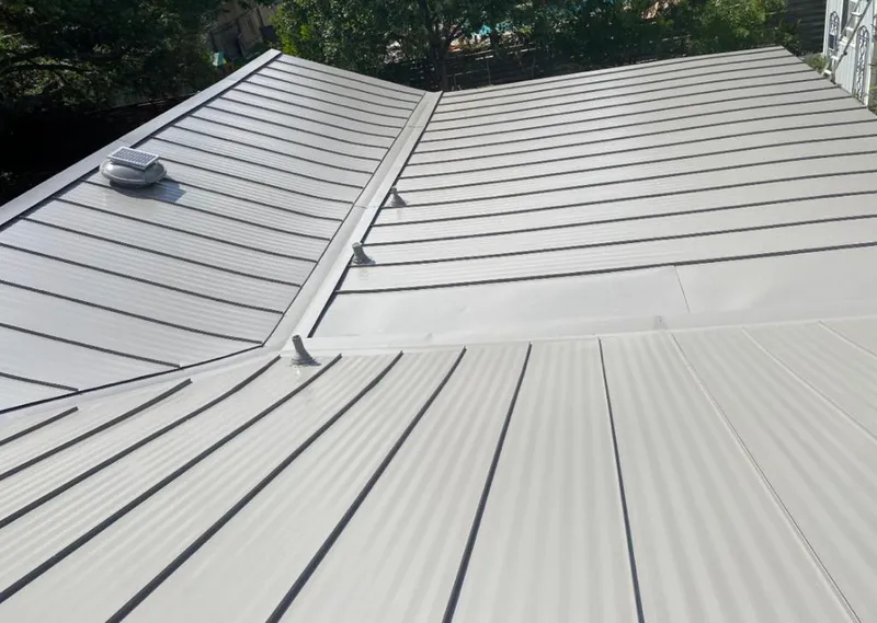Solar attic fan installed on a metal roof for Roof Ventilation in North Versailles
